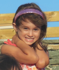 The wind loves Alaina's hair too, although it tangles it beyond belief!