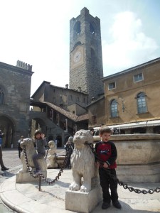They so don't appreciate that they are playing in a gorgeous medieval square.
